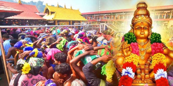 സന്നിധാനത്ത് കനത്ത മഴയിലും ഭക്തജനത്തിരക്ക് സന്നിധാനത്ത് കനത്ത മഴയിലും ഭക്തജനത്തിരക്ക്