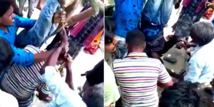 ബൈക്ക് മോഷ്ടിച്ചുവെന്ന് ആരോപിച്ച് യുവാവിനെ തലകീഴായി കെട്ടിത്തൂക്കി ആൾക്കൂട്ട മർദനം ബൈക്ക് മോഷ്ടിച്ചുവെന്ന് ആരോപിച്ച് യുവാവിനെ തലകീഴായി കെട്ടിത്തൂക്കി ആൾക്കൂട്ട മർദനം