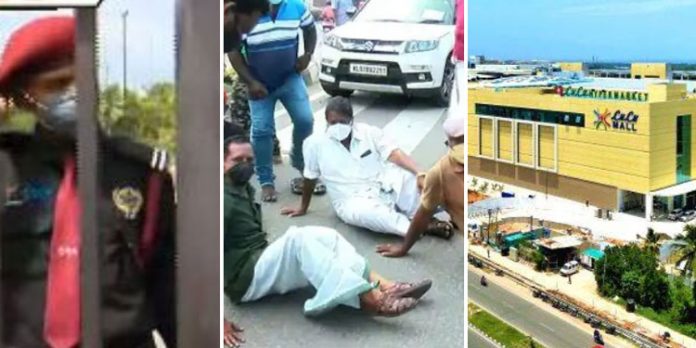 ലുലു മാളിന് മുന്നില് പ്രതിഷേധവുമായി സമരക്കാര് ; ജീവനക്കാരെ ഗേറ്റിനുമുന്നില് തടഞ്ഞു ലുലു മാളിന് മുന്നില് പ്രതിഷേധവുമായി സമരക്കാര് ; ജീവനക്കാരെ ഗേറ്റിനുമുന്നില് തടഞ്ഞു