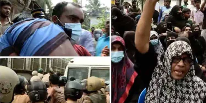 കോതിയിൽ മാലിന്യ സംസ്കരണ പ്ലാന്റ് നിർമാണത്തിനെതിരെ പ്രതിഷേധിച്ച സ്ത്രീകളെയും കുട്ടികളെയും പോലീസ് ബലംപ്രയോഗിച്ച് റോഡിലൂടെ വലിച്ചിഴച്ചു കോതിയിൽ മാലിന്യ സംസ്കരണ പ്ലാന്റ് നിർമാണത്തിനെതിരെ പ്രതിഷേധിച്ച സ്ത്രീകളെയും കുട്ടികളെയും പോലീസ് ബലംപ്രയോഗിച്ച് റോഡിലൂടെ വലിച്ചിഴച്ചു