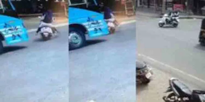 നിയമം ലംഘിച്ച് വിദ്യാര്ത്ഥിനികളുടെ സ്കൂട്ടര് അഭ്യാസം ; ബസിടിക്കാതെ അപകടത്തില് നിന്ന് രക്ഷപെട്ടത് തലനാരിഴക്ക് നിയമം ലംഘിച്ച് വിദ്യാര്ത്ഥിനികളുടെ സ്കൂട്ടര് അഭ്യാസം ; ബസിടിക്കാതെ അപകടത്തില് നിന്ന് രക്ഷപെട്ടത് തലനാരിഴക്ക്