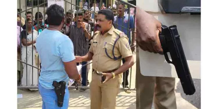 കുടിവെള്ള പ്രശ്നം പരിഹരിക്കണം ; തോക്കുമായി യുവാവിന്റെ പ്രതിഷേധം കുടിവെള്ള പ്രശ്നം പരിഹരിക്കണം ; തോക്കുമായി യുവാവിന്റെ പ്രതിഷേധം
