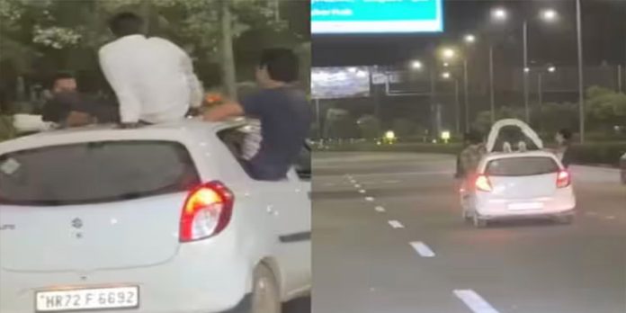 ഓടുന്ന കാറിന് മുകളില് കയറി പുഷ് അപ് ചെയ്തു ; യുവാവിനെ തിരഞ്ഞ് പോലീസ് ഓടുന്ന കാറിന് മുകളില് കയറി പുഷ് അപ് ചെയ്തു ; യുവാവിനെ തിരഞ്ഞ് പോലീസ്
