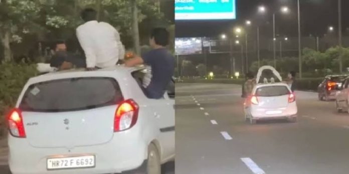 അമിത വേഗതയില് ഓടുന്ന കാറിന് മുകളില് കയറി പുഷ് അപ് ; ഉടമക്ക് 6500 രൂപ പിഴ , കേസെടുത്ത് പോലീസ് അമിത വേഗതയില് ഓടുന്ന കാറിന് മുകളില് കയറി പുഷ് അപ് ; ഉടമക്ക് 6500 രൂപ പിഴ , കേസെടുത്ത് പോലീസ്