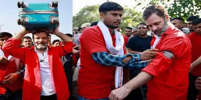 ചുവന്ന ഷർട്ടും തലയിൽ ചുമടുമായി തൊഴിലാളികൾക്കൊപ്പം ചേർന്ന് രാഹുൽ ഗാന്ധി ചുവന്ന ഷർട്ടും തലയിൽ ചുമടുമായി തൊഴിലാളികൾക്കൊപ്പം ചേർന്ന് രാഹുൽ ഗാന്ധി