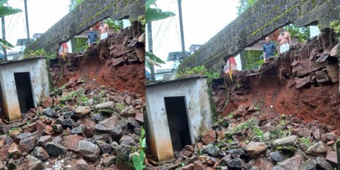 കനത്ത മഴയിൽ പഞ്ചായത്ത് റോഡിൻ്റെ ഡി.ആർ കെട്ട് തകർന്ന് വീട്ടുമുറ്റത്തേക്ക് വീണു കനത്ത മഴയിൽ പഞ്ചായത്ത് റോഡിൻ്റെ ഡി.ആർ കെട്ട് തകർന്ന് വീട്ടുമുറ്റത്തേക്ക് വീണു