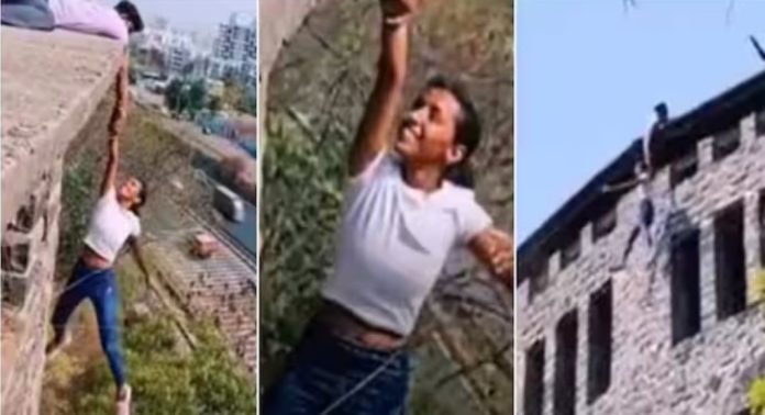കെട്ടിടത്തിൽ തൂങ്ങിക്കിടന്ന് റീൽസ് അഭ്യാസം ; പെൺകുട്ടിക്കും 4 പേർക്കും എതിരെ കേസ് കെട്ടിടത്തിൽ തൂങ്ങിക്കിടന്ന് റീൽസ് അഭ്യാസം ; പെൺകുട്ടിക്കും 4 പേർക്കും എതിരെ കേസ്