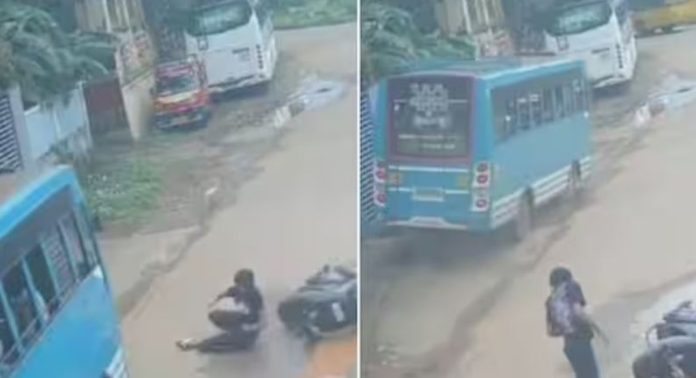 റോഡിൽ തെന്നിവീണ സ്കൂട്ടർ യാത്രികൻ ബസിനടിയിൽ പെടാതെ രക്ഷപെട്ടു ; ഞെട്ടിപ്പിക്കുന്ന ദൃശ്യങ്ങൾ പുറത്ത് റോഡിൽ തെന്നിവീണ സ്കൂട്ടർ യാത്രികൻ ബസിനടിയിൽ പെടാതെ രക്ഷപെട്ടു ; ഞെട്ടിപ്പിക്കുന്ന ദൃശ്യങ്ങൾ പുറത്ത്