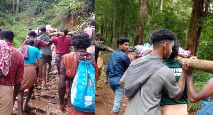 കനത്ത മഴയിൽ റോഡ് തകർന്നു ; രോഗിയായ വീട്ടമ്മയെ വീട്ടിലെത്തിച്ചത് രണ്ട് കിലോമീറ്റർ ദൂരം ചുമന്ന് കനത്ത മഴയിൽ റോഡ് തകർന്നു ; രോഗിയായ വീട്ടമ്മയെ വീട്ടിലെത്തിച്ചത് രണ്ട് കിലോമീറ്റർ ദൂരം ചുമന്ന്