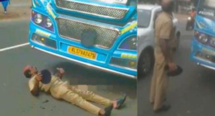 വിദ്യാർഥികളെ കയറ്റാതെ പോവാനൊരുങ്ങിയ സ്വകാര്യ ബസ് റോഡിൽ കിടന്ന് തടഞ്ഞ് ട്രാഫിക് ഡ്യൂട്ടിയിലുണ്ടായിരുന്ന ഹോം ഗാർഡ് വിദ്യാർഥികളെ കയറ്റാതെ പോവാനൊരുങ്ങിയ സ്വകാര്യ ബസ് റോഡിൽ കിടന്ന് തടഞ്ഞ് ട്രാഫിക് ഡ്യൂട്ടിയിലുണ്ടായിരുന്ന ഹോം ഗാർഡ്