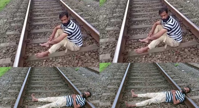 മദ്യലഹരിയിൽ റെയിൽവേ ട്രാക്കിൽ കിടന്ന് യുവാവിന്റെ പരാക്രമം ; ഒടുവിൽ കസ്റ്റഡിയിൽ മദ്യലഹരിയിൽ റെയിൽവേ ട്രാക്കിൽ കിടന്ന് യുവാവിന്റെ പരാക്രമം ; ഒടുവിൽ കസ്റ്റഡിയിൽ