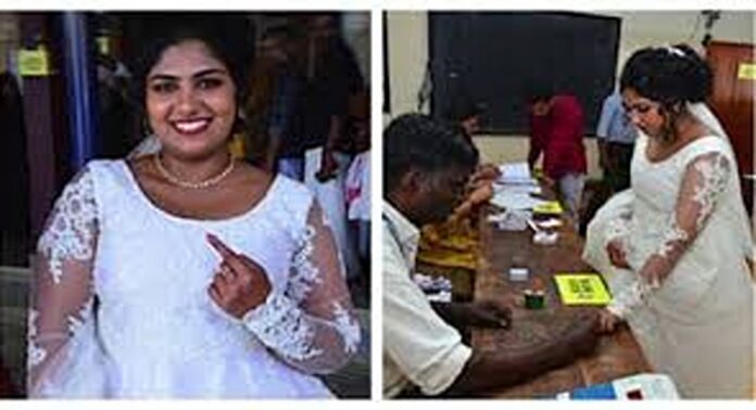വയനാട് വിവാഹ ചടങ്ങിന് മുൻപ് വോട്ട് ചെയ്യാൻ എത്തി വധു വയനാട് വിവാഹ ചടങ്ങിന് മുൻപ് വോട്ട് ചെയ്യാൻ എത്തി വധു